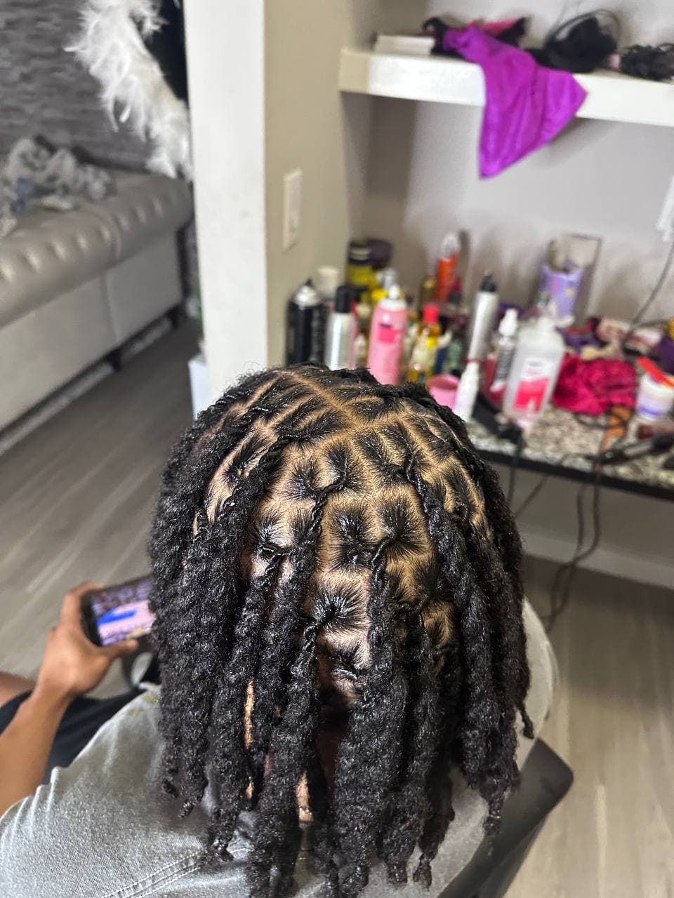 Loc Retwist & Style by Braids by Praise in Austin TX